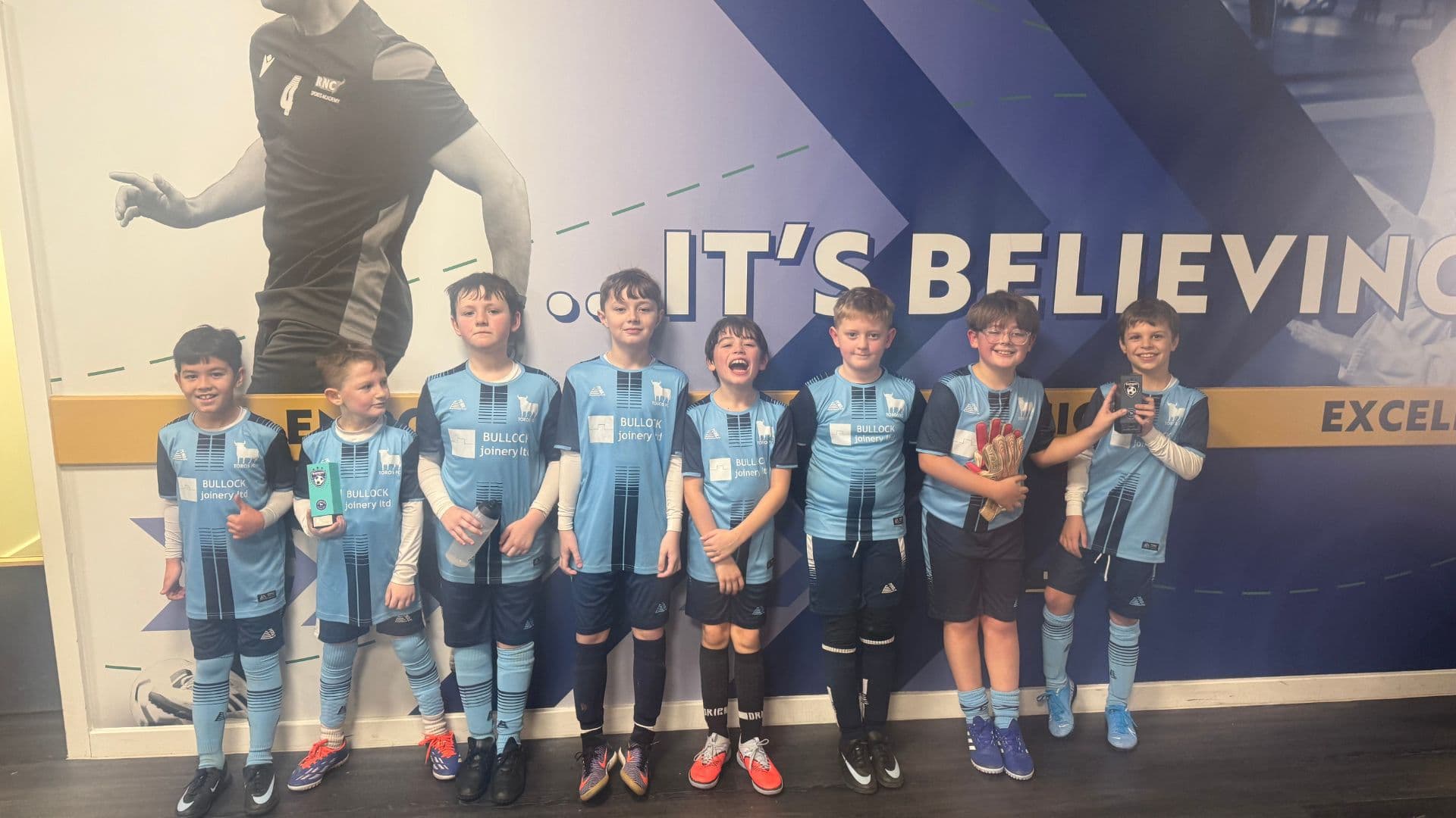 Origins Football players in action